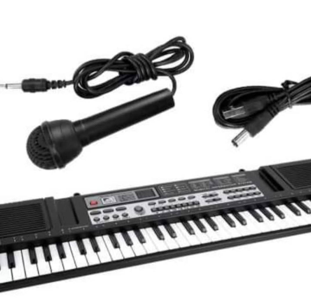 Piano apprentissage pour enfants et grandes personnes, ça prend une clé USB , 61 touches et micro
