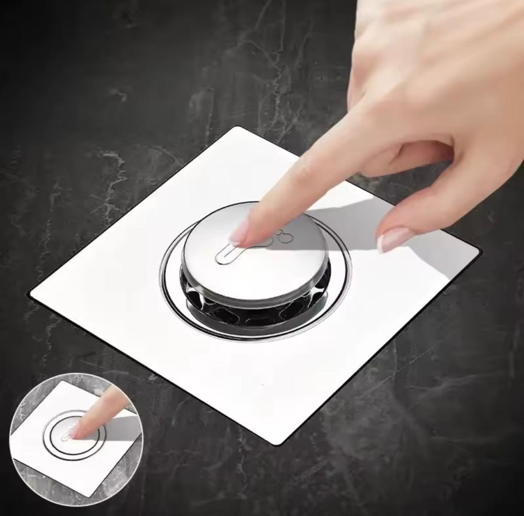 Prix : 2000f au lieu 6000f.           Siphon de sol rond à pied escamotable, couvercle HOFloor, salle de douche, bouchon de vidange à pousser vers le bas ,drain de douche en acier inoxydable.