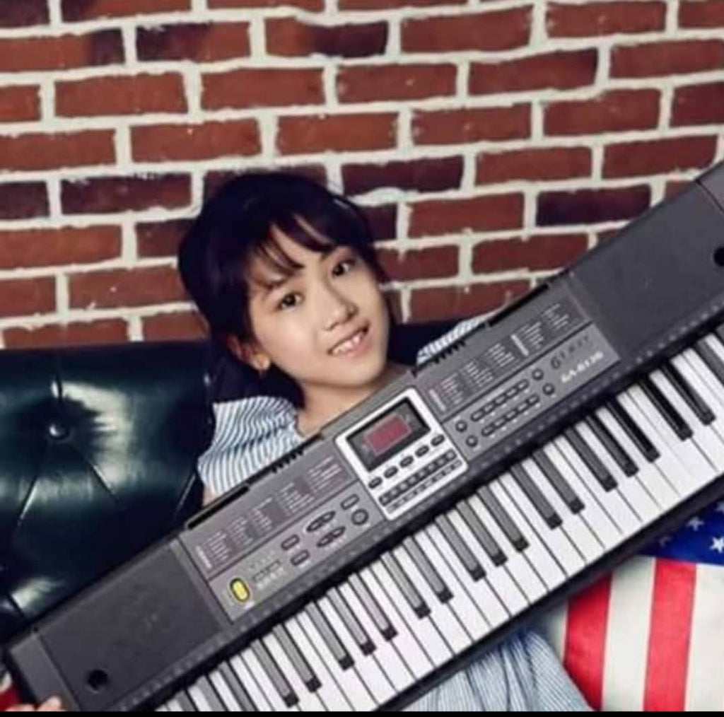 Piano apprentissage pour enfants et grandes personnes, ça prend une clé USB , 61 touches et micro