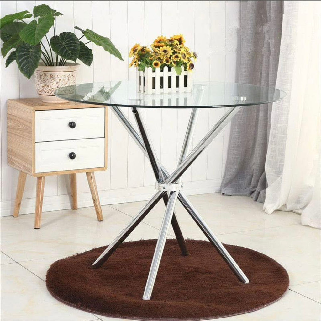 Prix : 18000f .                                 Table de salle à manger ronde de luxe moderne en métal et verre et très solide .