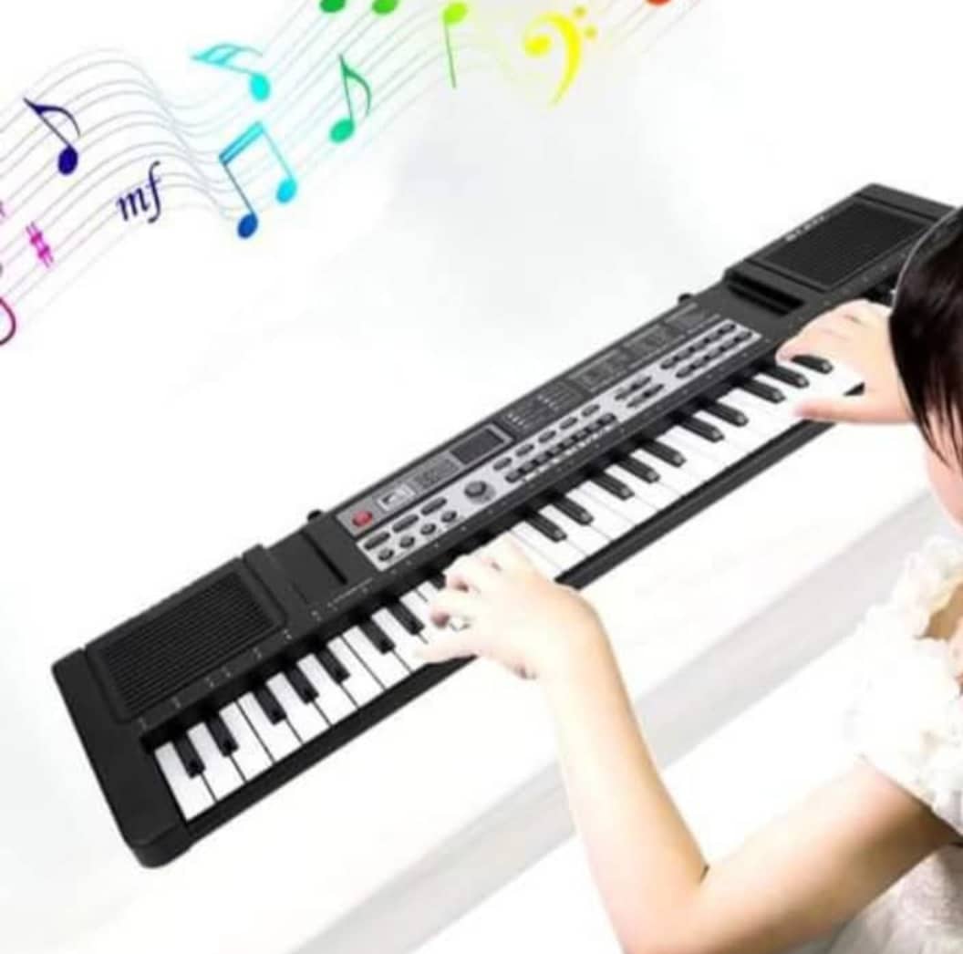 Piano apprentissage pour enfants et grandes personnes, ça prend une clé USB , 61 touches et micro